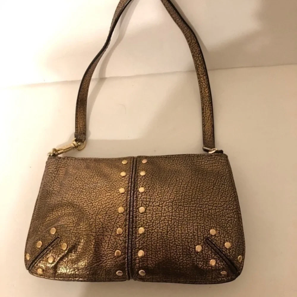 MICHAEL KORS wristlet mini bag studded metallic